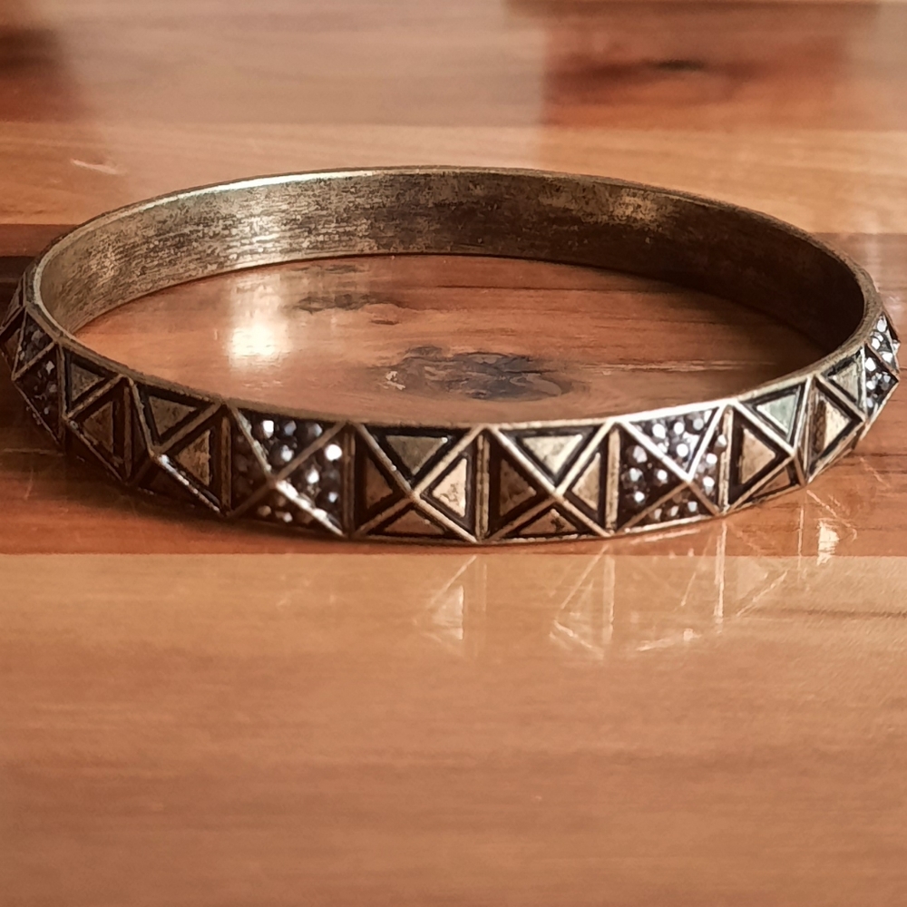 Gold tone bangle bracelet